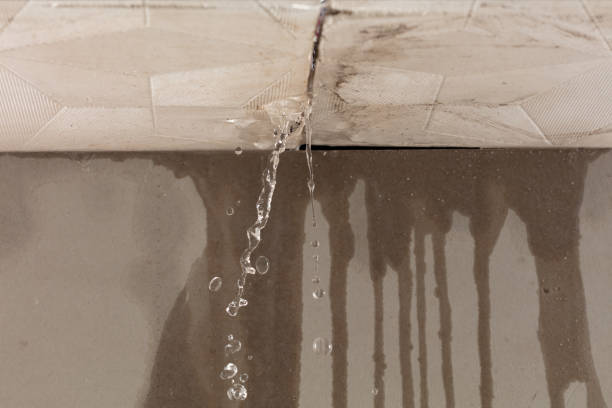 Professional Sewage Cleanup technician working in Claremont, NH